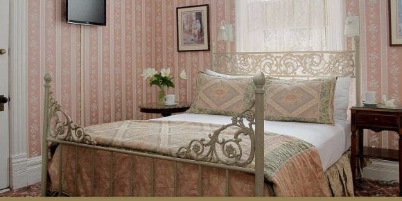 Emily Rose Room queen bed and side tables