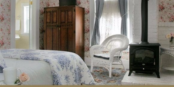 Jessica’s Haven Room bed, armoire and fireplace