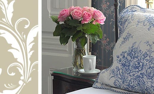 Eel Valley Suite room detail with vase of roses and cup of tea