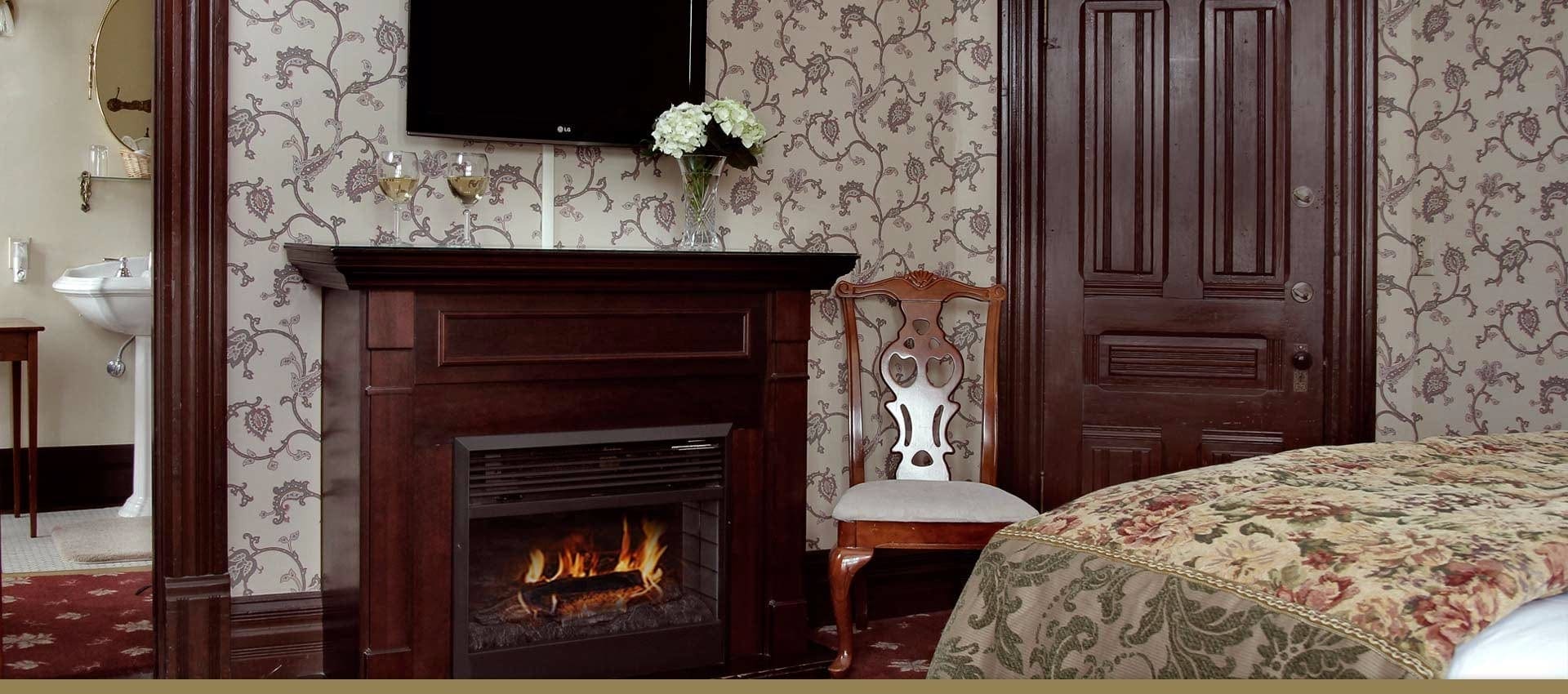 Victorian Village Inn Ira Rus suite fireplace and bathroom